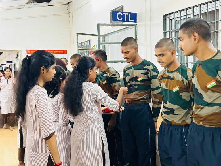 Students Tieing Rakhi to Army Soldiers